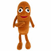 A brown plush toy shaped like a shark with large eyes and a smiling mouth.