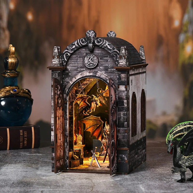 A wooden book nook kit featuring a dragon treasure labyrinth design, displayed as a decorative miniature.