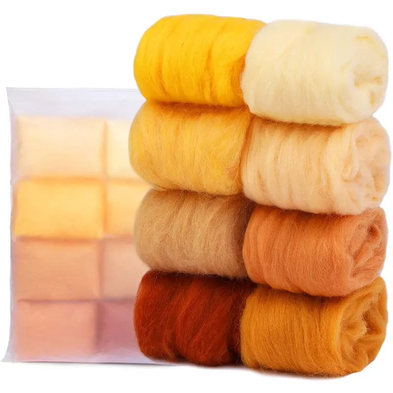 A stack of eight colored wool roving packs for needle felting, showing shades of yellow, orange, and brown.