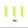 Three glow-in-the-dark yellow string launcher toys for kids