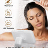A woman is using an IPX6 waterproof mobile phone storage box designed for shower use.