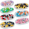 A collection of 45 round silicone beads in various colors and animal shapes for jewelry making.