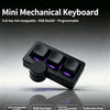 A black mini mechanical keyboard featuring purple RGB backlight and a round multimedia knob.