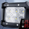 A black LED flood light pod with four bright yellow light sources is shown against a gray background.
