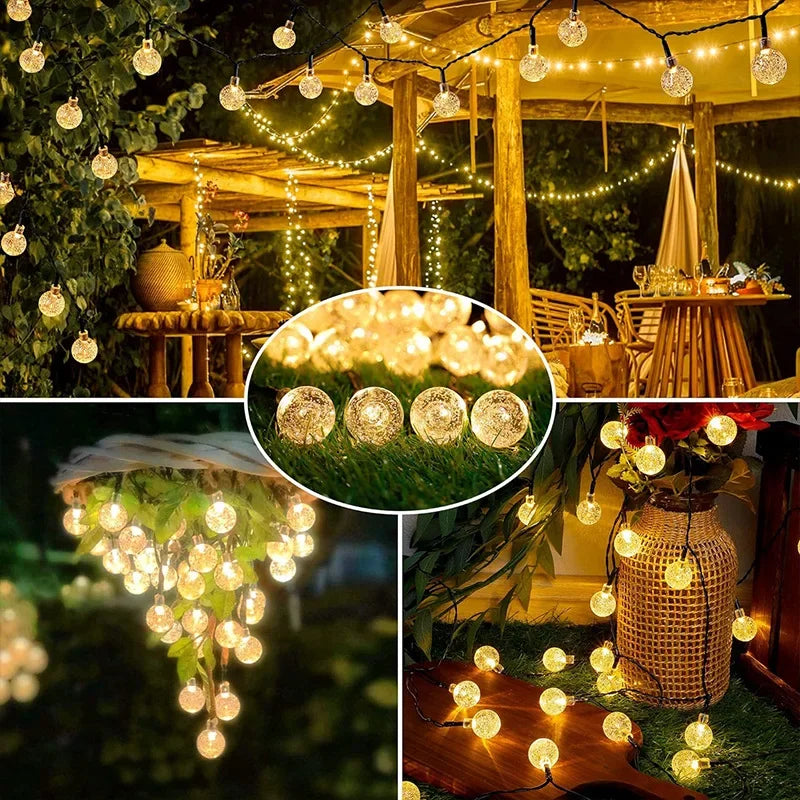 Outdoor fairy lights strung across a wooden pergola and draped on greenery, illuminating a festive outdoor setting.
