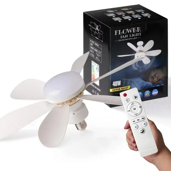 Una mano sostiene un ventilador de techo LED blanco moderno con control remoto y su caja de embalaje.