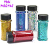 A collection of four glass jars filled with various holographic glitter nail polish colors and a red glitter product.