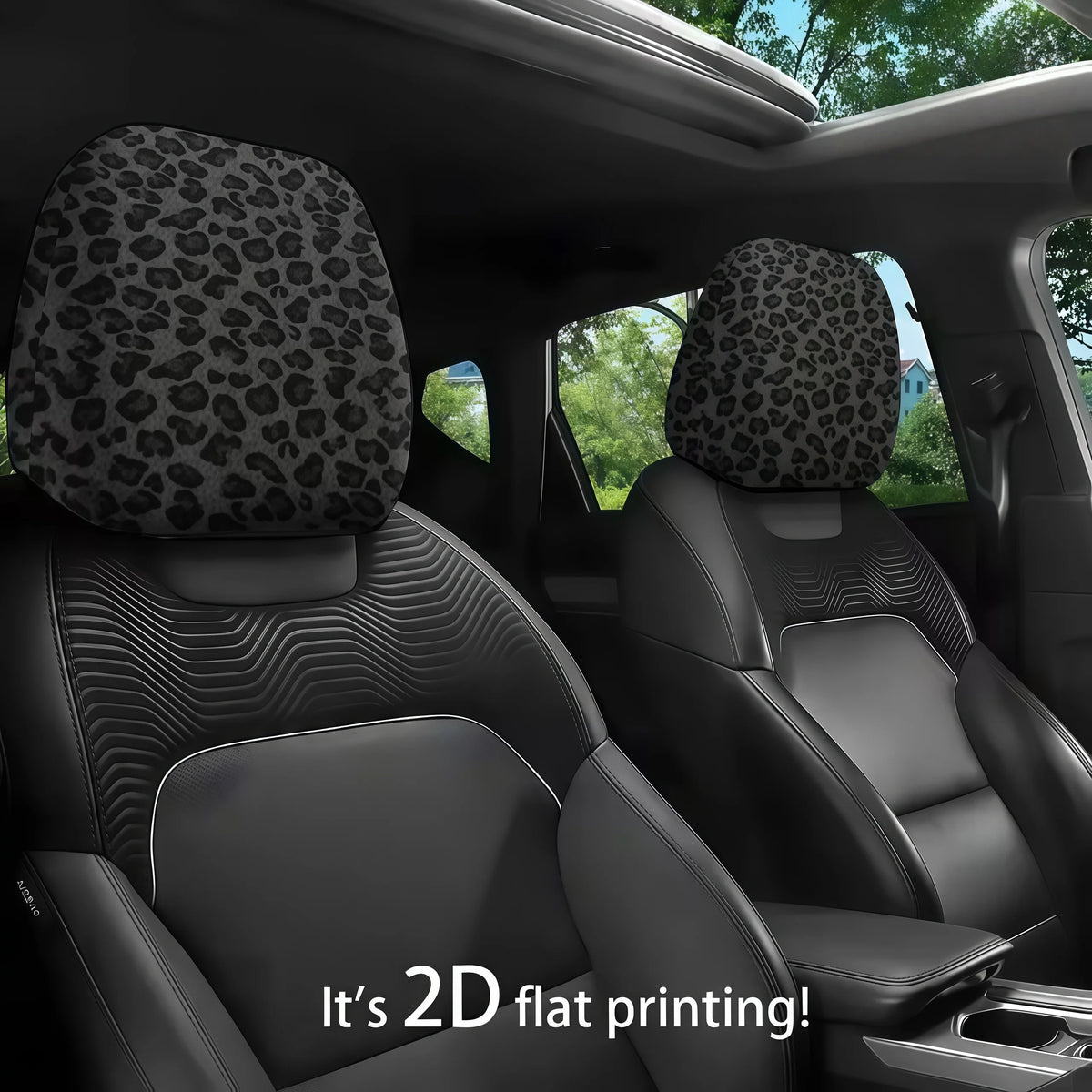Two black car headrest covers with leopard print fabric installed in a vehicle interior.