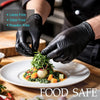 Hands wearing black disposable gloves are carefully plating a green salad on a white plate.