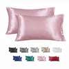 Colección de fundas de almohada de satén de seda en rosa, gris, blanco, azul, verde y rojo.