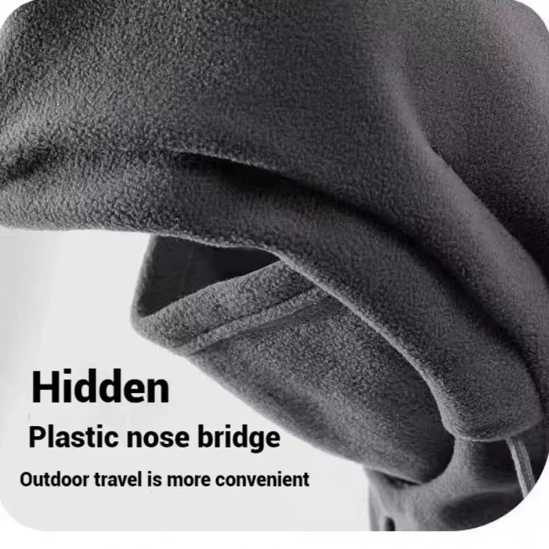 Close-up of a gray winter balaclava showing a hidden plastic nose bridge feature.