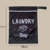 Black portable waterproof laundry bag with white text reading LAUNDRY Bag