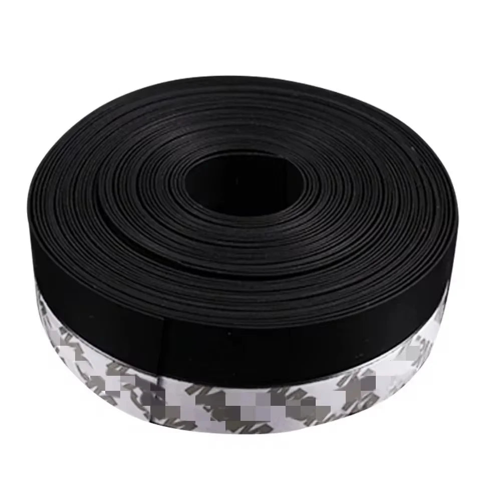 Roll of black self-adhesive weatherproof door and window seal strip