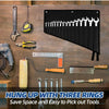 A black tool organizer with three rings hangs on a wooden surface, showing various tools like wrenches and pliers.