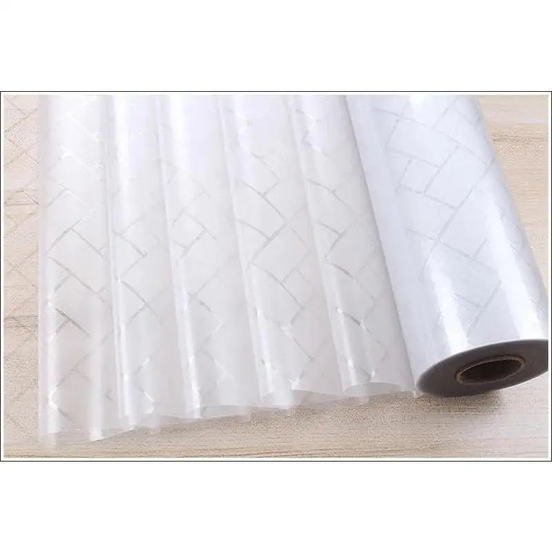 Roll of white decorative frosted window privacy film with a diamond pattern