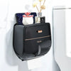 Porta de papel higiénico impermeable negro con arreglo floral decorativo.