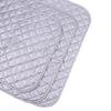 A stack of light gray quilted ironing mats for wrinkle removal.