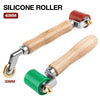 A silicone roller tool with a wooden handle and metal mechanism, showing both 40mm and 30mm sizes.