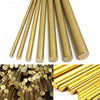 A close-up view of precision brass bar rods used for wire and tube making.