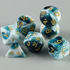 A set of seven polyhedral dice featuring a marbled blue and white design with gold numbering.