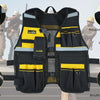 A black and yellow reflective tool vest featuring multiple pockets, adjustable straps, and a phone holder.
