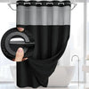 Black dotted waffle weave shower curtain hanging on a metal rod