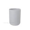 A white ceramic bathroom organizer set with a soap dispenser.