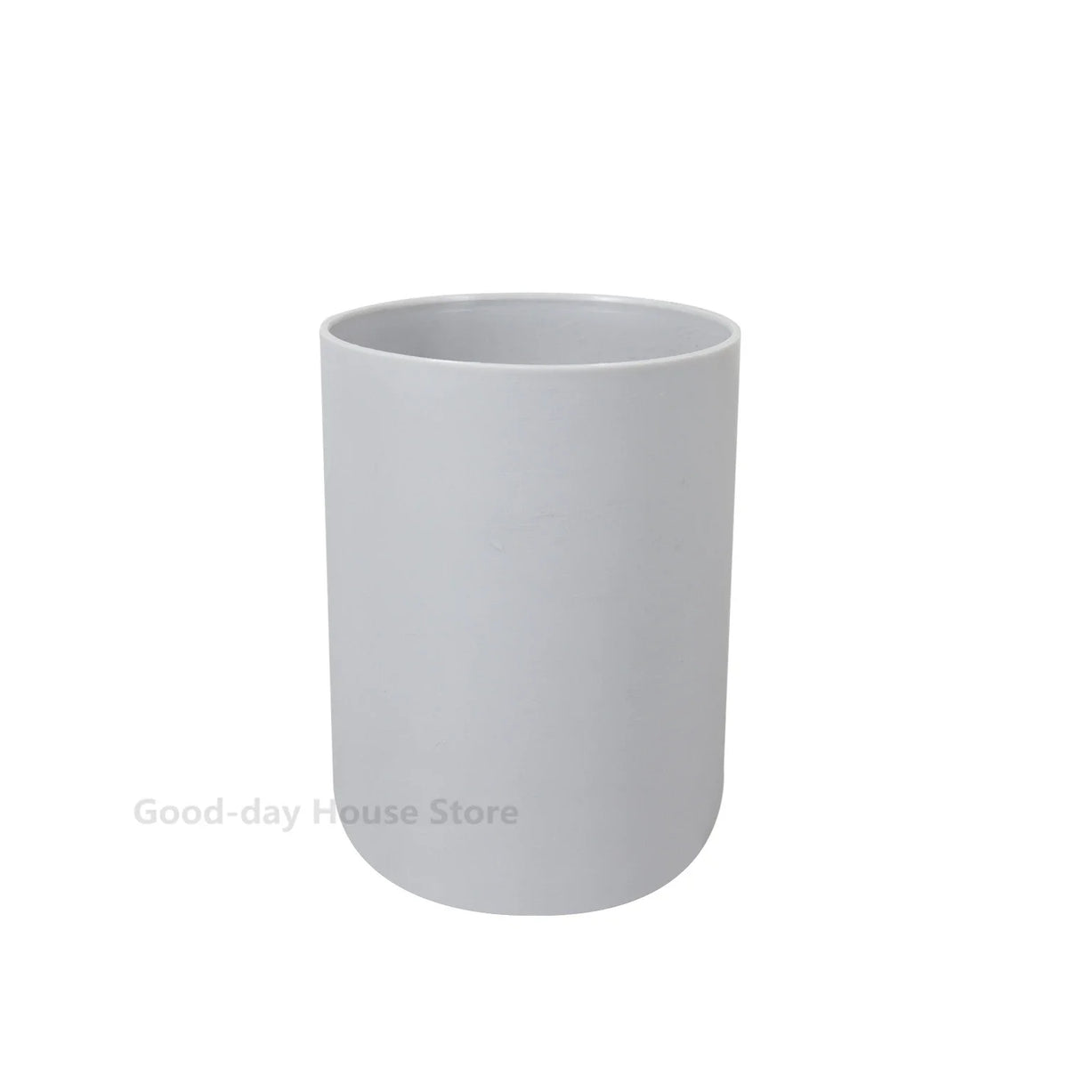 A white ceramic bathroom organizer set with a soap dispenser.