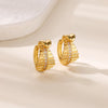 Boucles d'oreilles créoles en zircon cubique ton or