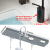 A silicone faucet mat is shown with water flowing from a faucet, demonstrating its use for kitchen sinks.