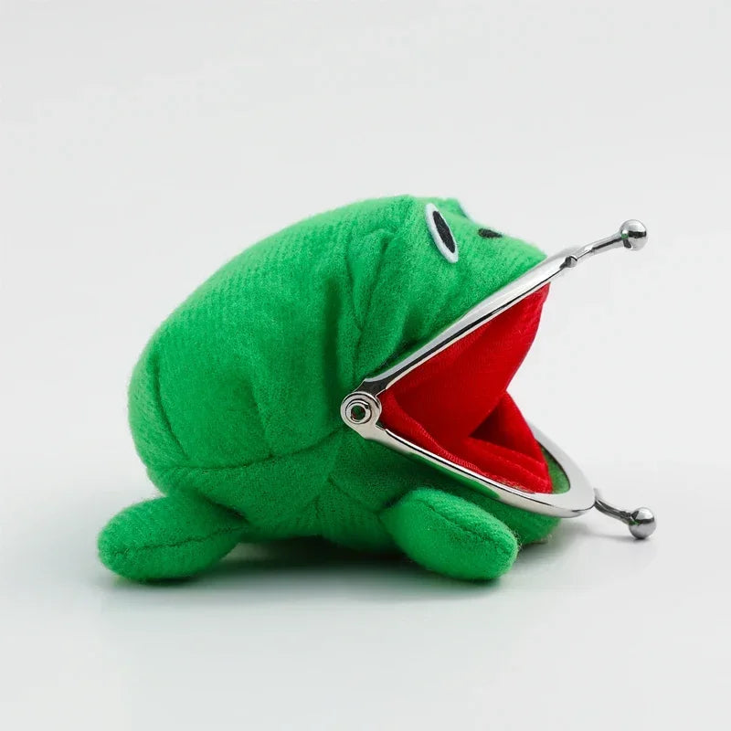 A green plush frog coin purse with a red mouth opening and silver keychain hardware.
