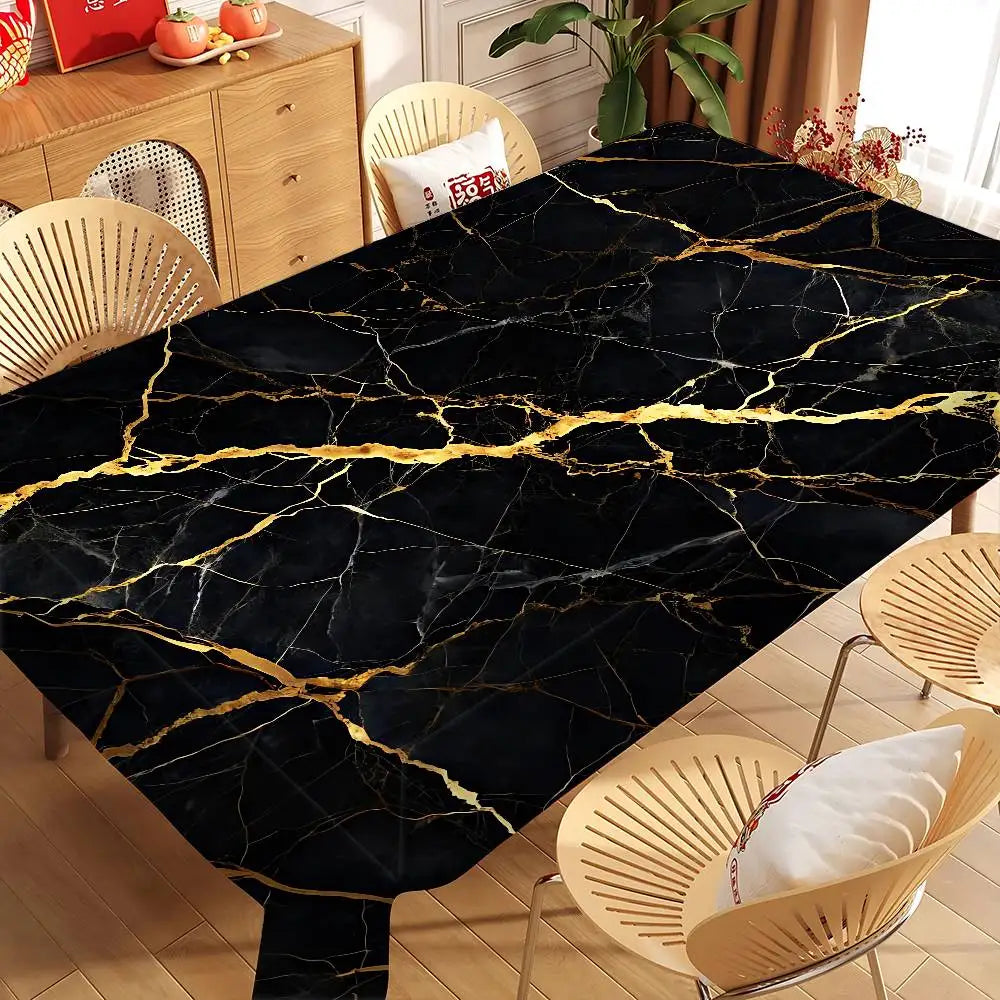 Black gold marble waterproof tablecloth displayed on a dining table with wicker chairs.