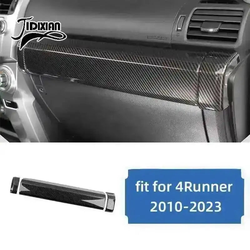 Carbon fiber trim kit for a 4Runner vehicle interior component.