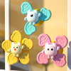 A set of three suction cup spinner bath toys featuring cute animal shapes in light blue, yellow, and pink.