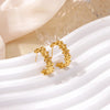 Boucles d'oreilles créoles en zircon cubique ton or