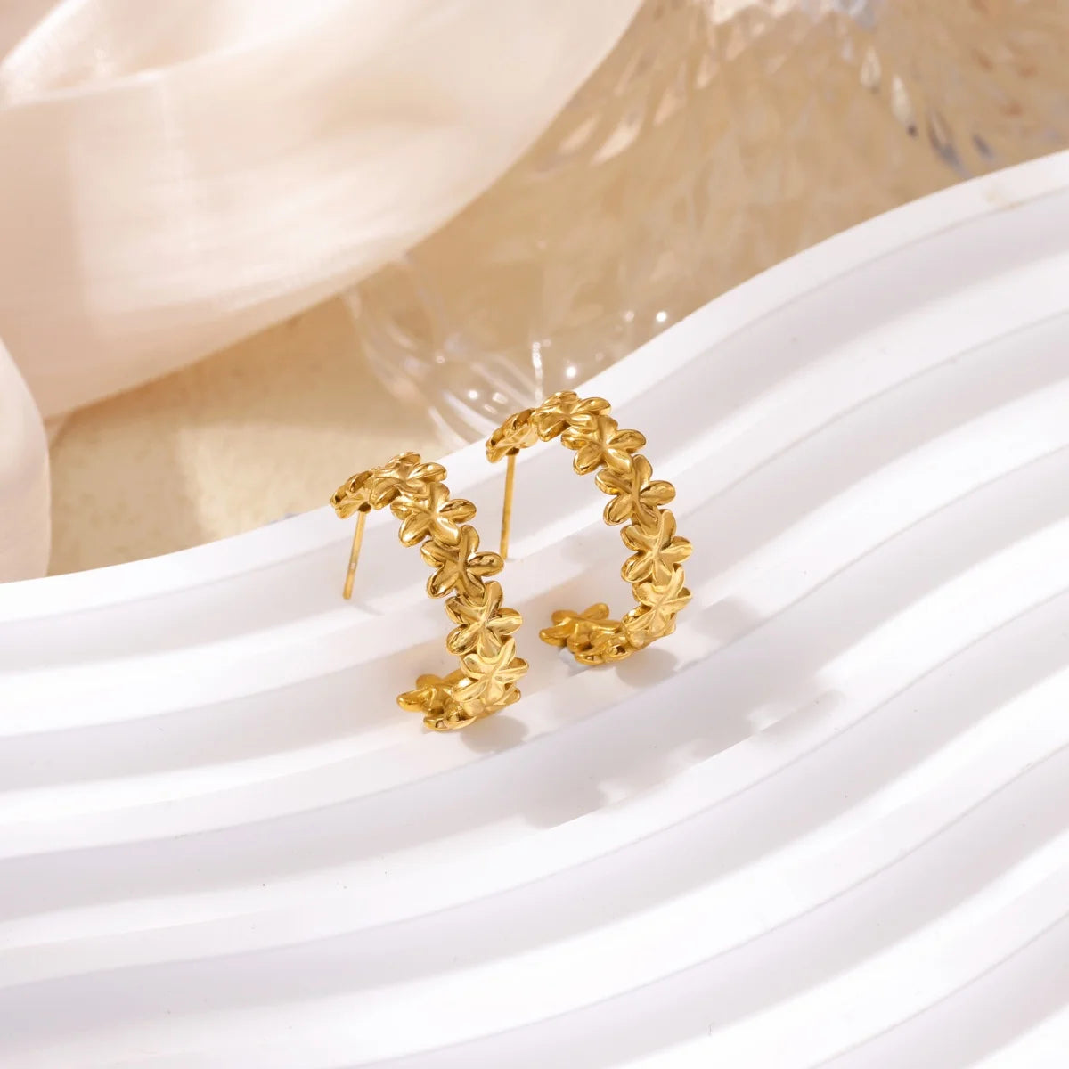 Boucles d'oreilles créoles en zircon cubique ton or