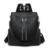Black leather anti-theft backpack with padded straps and zippered compartments
