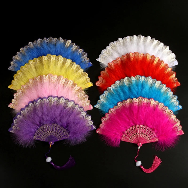 A collection of nine vintage lace-trimmed folding fans in various shades of pink, purple, yellow, and blue.