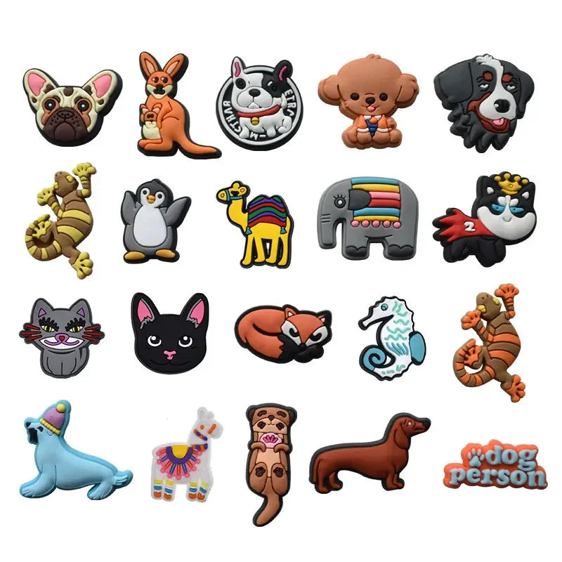 A collection of fun PVC pins featuring various animal characters like cats, dogs, and other creatures for decoration.