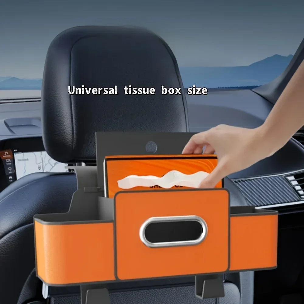 An orange tissue box holder is shown mounted in a car seat organizer with cup holders and hooks.