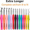 Extra Longer complete set of crochet hooks from size B to N displayed in a row.