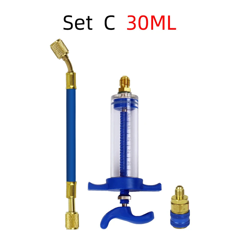 Set C 30ML of an air conditioning oil and dye injector kit including a syringe and quick coupler.