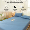 A blue fitted bed sheet set and pillowcase displayed on a bed, emphasizing protection for the mattress.