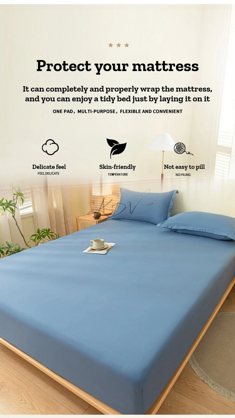A blue fitted bed sheet set and pillowcase displayed on a bed, emphasizing protection for the mattress.
