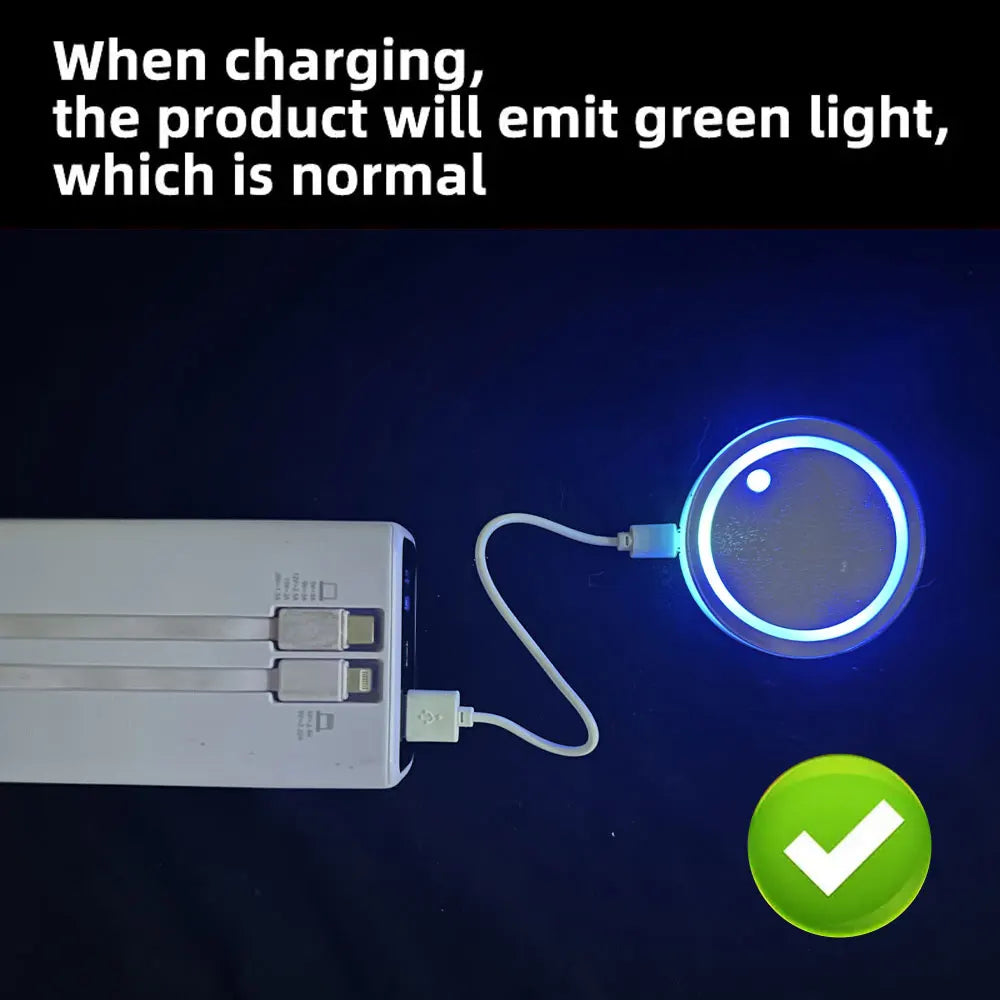 A white product is shown emitting a green light while charging, with a separate LED light glowing blue.