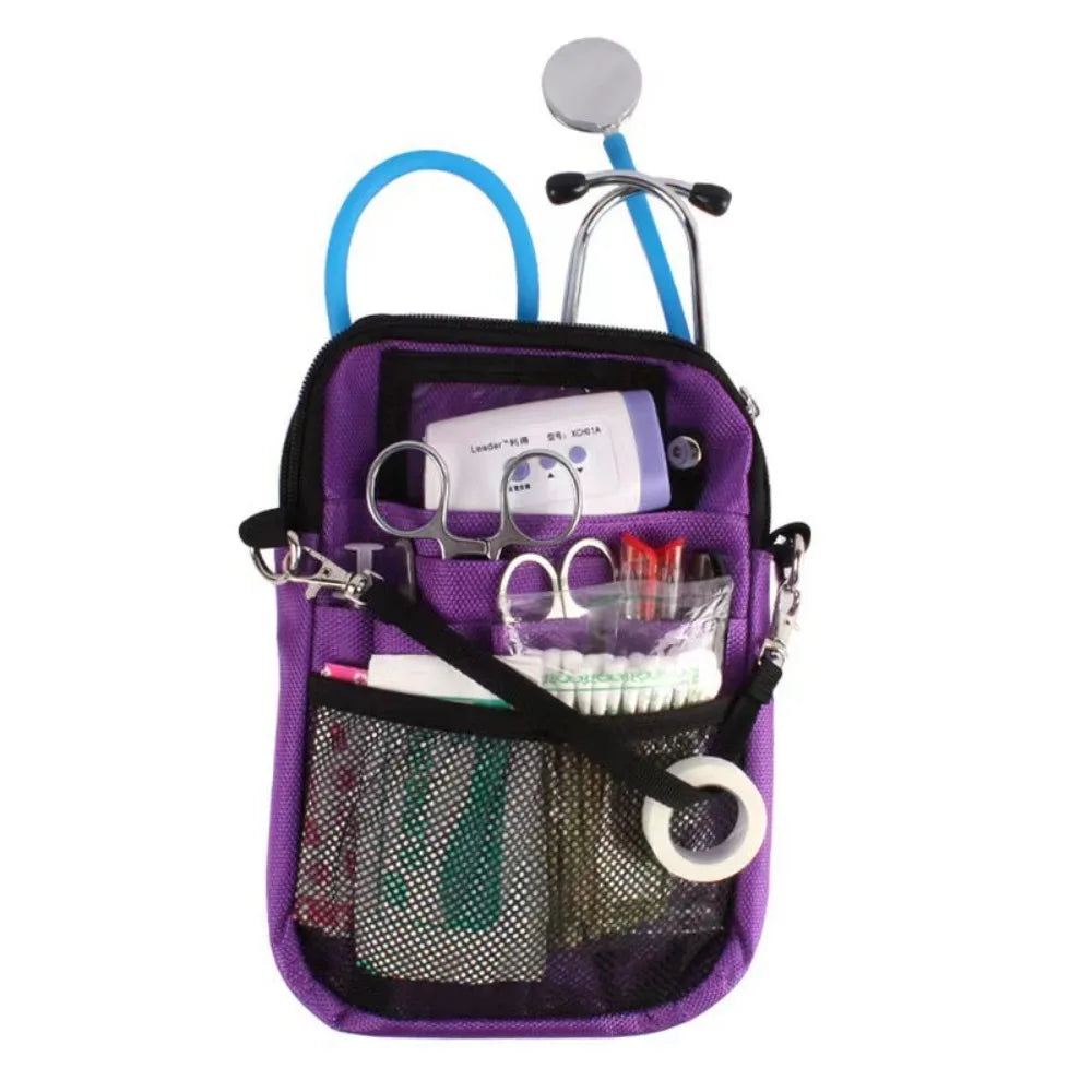 Purple multi-pocket crossbody fanny pack with a silver clip and a white electronic device.