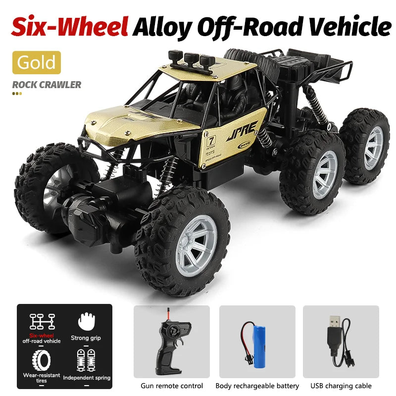 Gold six-wheel alloy off-road RC crawler vehicle with large tires and accessories