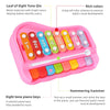 A pink musical piano with eight colorful tone keys and a small hammering hammer for baby's hand muscle development
