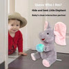 A plush elephant toy is shown next to a baby, illustrating a hide and seek interaction partner.