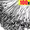 A close-up view of numerous silver stainless steel cable ties arranged in a fan pattern.
